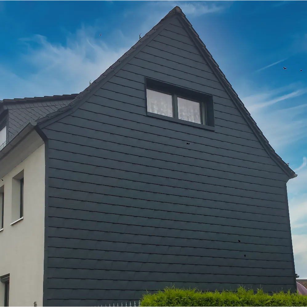 Moderne Schieferfassade und Steildachsanierung an Wohnhaus in Halle - Dachdeckermeister Pries
